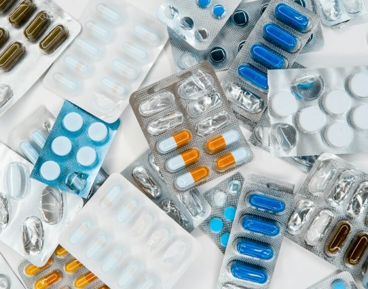 Multiple pharmaceutical blister packs and drug packaging representing the Indian branded-generic medicine market