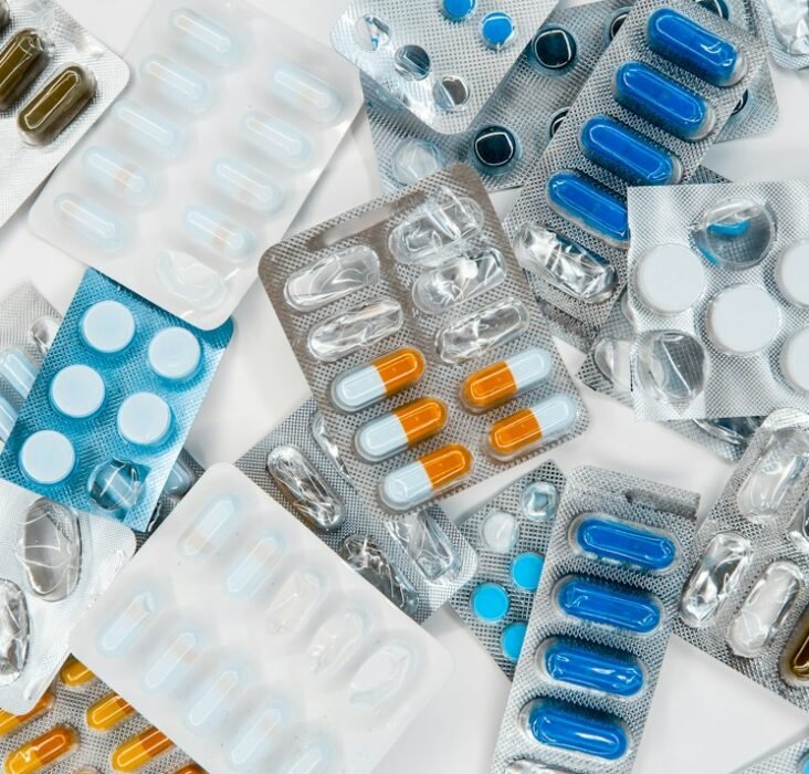 Multiple pharmaceutical blister packs and drug packaging representing the Indian branded-generic medicine market