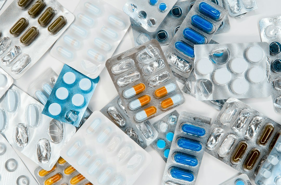 Multiple pharmaceutical blister packs and drug packaging representing the Indian branded-generic medicine market